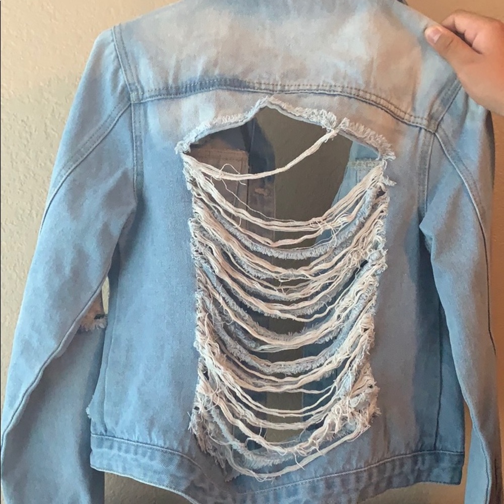 Distressed jean jacket